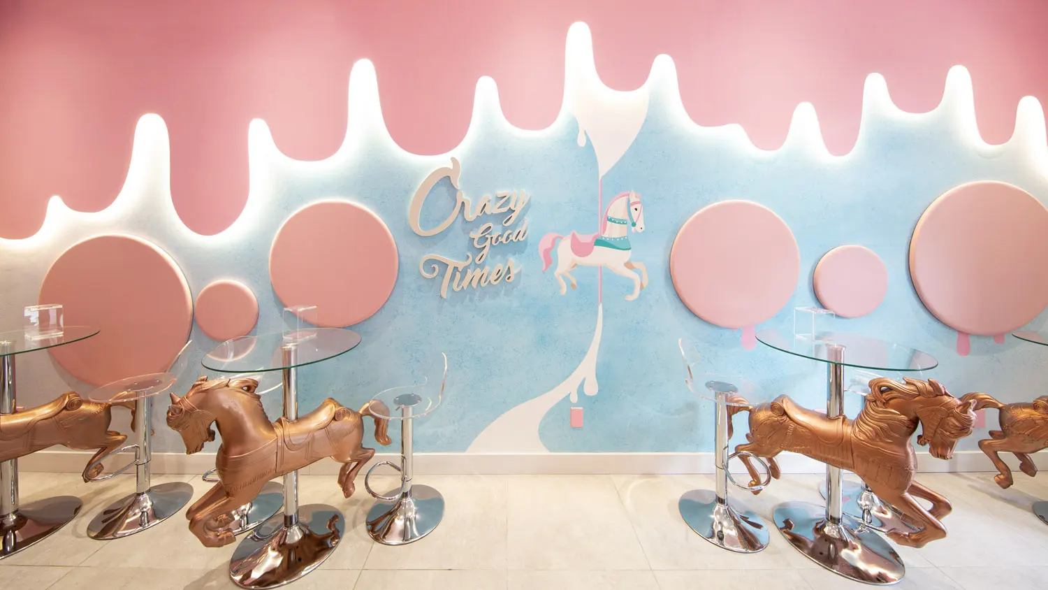 Interior design project for Crazy Crepes. Designed custom furnitures merry-go-round horse decorations