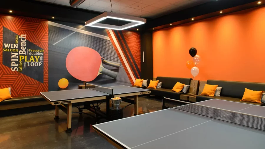 Interior design project for Whiff Waff Bar & Lounge. Designed the bar with a very efficient design that we complimented with an eye-catching theme color of contrasting orange and black